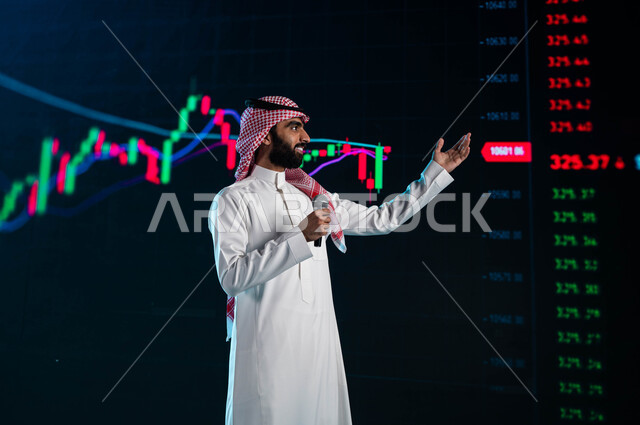 Analyzing data and digital information, a Saudi Arabian Gulf businessman holding a microphone and speaking at a Saudi economic conference, a presentation on financial investment and the stock market, suggestions and advice on electronic trading, the backg