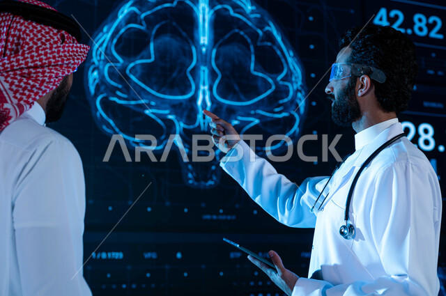 تشخيص وشرح الحالات المرضية عبر شاشة إلكترونية حديثة، طبيب عربي سعودي خليجي يرتدي المعطف الأبيض ونظارة الواقع الإفتراضي ويحمل التابلت، مراكز ومستشفيات حديثة متطورة، شاشة هولوجرامية ثلاثية الأبعاد لتصوير الرنين المغناطيسي للدماغ البشري، رؤية مستقبيلة 2030