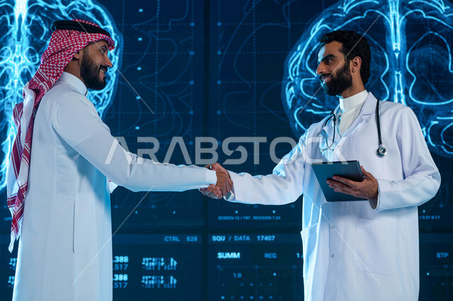 التعاقد مع شركات طبية متطورة، طبيب ورجل خليجيان سعوديان يتصافحان، تقديم الرعاية الصحية الحديثة، إستخدام تقنية الواقع ال‘فتراضي لتشخيص الحالات المرضية المستعصية، خلفية التصوير بالأشعة المغناطيسية الهولوجرامية ثلاثية الابعاد لمخ الانسان، رؤية مستقبلية 2030