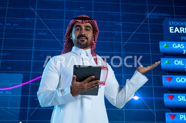 Explanation of the changes in commodity and wealth prices, a modern electronic screen background of the rise and fall of the stock index, a Saudi Arabian Gulf broadcaster and media presenter reading the news brief through a tablet, presenting Saudi econom