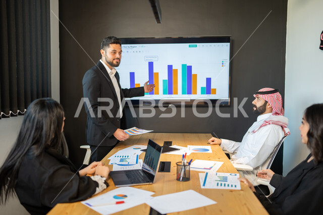 Studying and analyzing statistics and graphs, a meeting of an Arab Gulf Saudi work team to discuss business and develop new projects, holding workshops at the company's headquarters, integrating technology and technology with work, unity and understanding