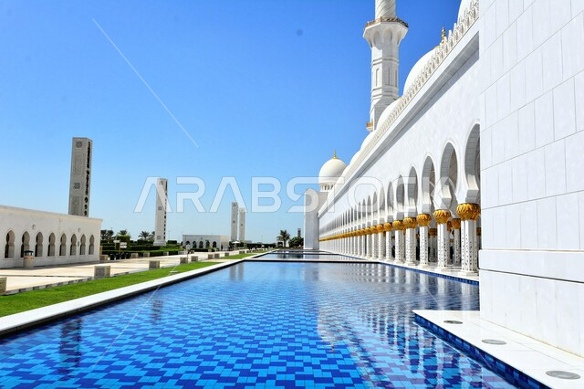 Water pond in the outer courtyard of the Sheikh Zayed Grand Mosque in the Emirate of Abu Dhabi in the United Arab Emirates, Islamic architecture in the Emirates, architectural art, famous religious landmarks, Islamic holy places