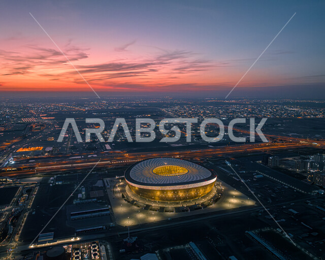 الفن الهندسي المعماري الحديث، صورة جوية لمدينة الدوحة و ملعب لوسيل وقت غروب الشمس, بطولة كأس العالم فيفا في مونديال قطر 2022, معالم الدوحة السياحية المشهورة، ملاعب و أنديه لممارسة الأنشطة الترفيهية الرياضية والمباريات والبطولات العالمية