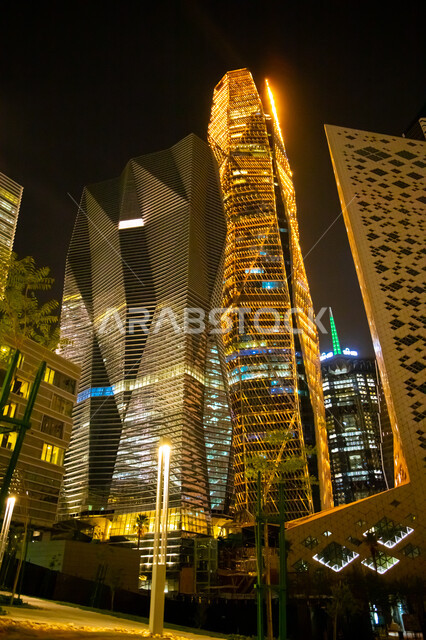 King Abdullah Financial Center (KAFD), the architectural art of the towers and skyscrapers illuminated at night in the Kingdom of Saudi Arabia in broad daylight, the financial and economic towers in the city of Riyadh, the famous landmarks of Riyadh