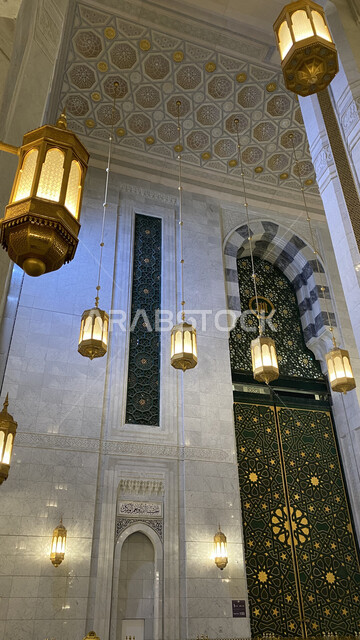 Interior decoration and Islamic motifs in King Abdullah's expansion of the Holy Mosque of Mecca, Islamic religious landmarks and sacred places, the luxurious golden design of lighting and chandeliers for the Grand Mosque in Makkah Al-Mukarramah in the Kin