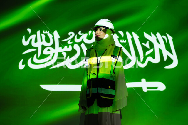 Development and development of the engineering sector with the help of the people of the nation, a smiling Saudi Arabian Gulf engineer, veiled, wearing a jacket and a protective helmet, merging the body with the light of science, Saudi Flag Day, March 11, celebrating the anniversary of the Saudi National Day, September 23, and the National Day, women’s professions and jobs.