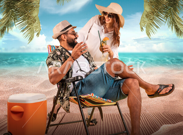 تبادل الاحاديث مع الزوجة بإيماءات السرور، قضاء أوقات الفراغ في العطله الصيفيه أمام البحر، شاب عربي خليجي سعودي يرتدي الزي الكاجوال والنظارة الشمسية يجلس على الكرسي  على الشاطئ في المناطق الساحليه، الترفيه عن النفس بالسياحة والسفر، تناول المشروبات الباردة