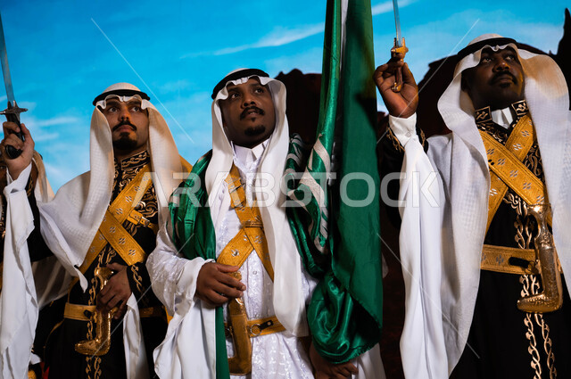 Traditional national holidays and occasions on September 23, a close-up of the Hijazi Ardha band looking at something, Saudi popular folklore, wearing the traditional daqla and bralette, Flag Day March 11, celebrating the anniversary of the Saudi National Day, the concept of love for the homeland and belonging to it