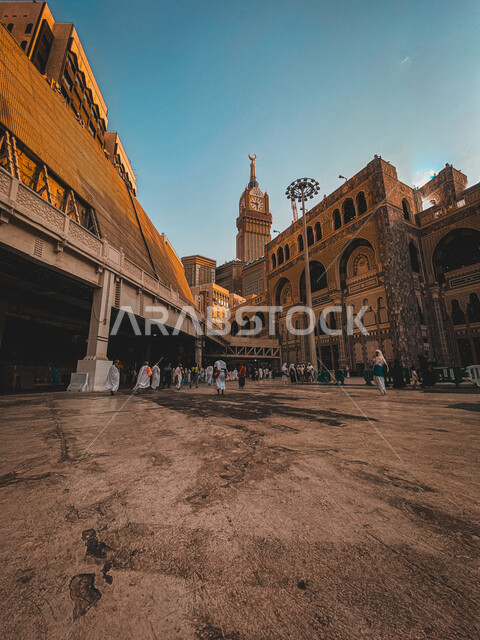 The Clock Tower in Makkah Al-Mukarramah in the Kingdom of Saudi Arabia, the architectural engineering art of towers and skyscrapers, the urban development and growth in the buildings of the city of Makkah Al-Mukarramah, the famous landmarks of Saudi Arabi