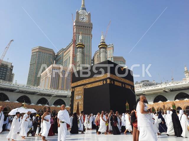 Performing the rituals of Hajj and Umrah, circumambulation of pilgrims and Umrah performers around the Kaaba in the Sacred House of God in Makkah Al-Mukarramah in the Kingdom of Saudi Arabia, the courtyards of the Holy Mosque of Mecca, worship and closene
