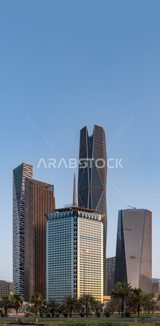 Urban growth and development in the Kingdom of Saudi Arabia, the green palm trees surrounding the King Abdullah Financial District (KAFD), the architectural art of the towers and skyscrapers in the city of Riyadh, the famous landmarks of Riyadh