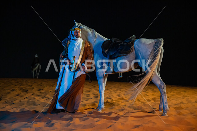 Saudi founding day 1727 AD, full-length body image, participation of horses in national occasions and holidays, love of equestrian and horseback riding, wearing the costumes of the people of the central region, a Saudi man wearing a bisht and a ghutra sta