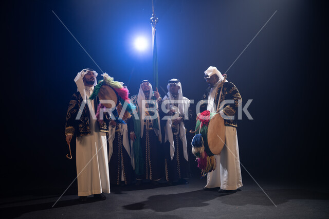The traditional folklore band on the National Day on September 23rd, the celebration of the Saudi Flag Day on the 11th of March, wearing the popular Najdi Arda costume, folk dance and celebrations on national occasions, commemorating the reunification of 