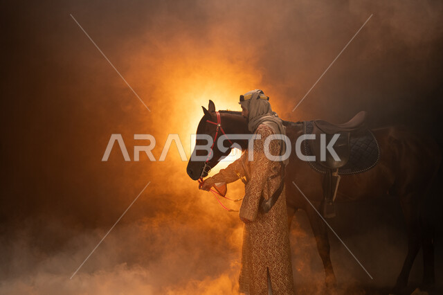 Saudi Founding Day, February 22, the love of equestrianism and the passion for raising horses, wearing costumes for national occasions and holidays, the anniversary of the founding of the first Saudi state in 1727 AD, a side image of a Gulf man wearing a 