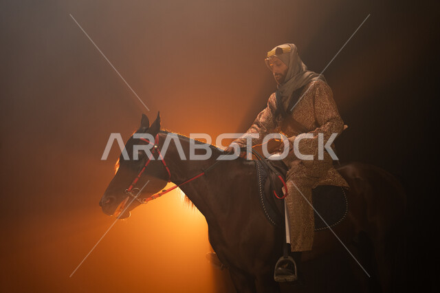 Practicing the hobby of horse riding, wearing costumes for national occasions and holidays, commemorating the founding of the first Saudi state in 1727 AD, Saudi Founding Day, February 22, a side photo of a Gulf man wearing a daghla and ghutra riding his 