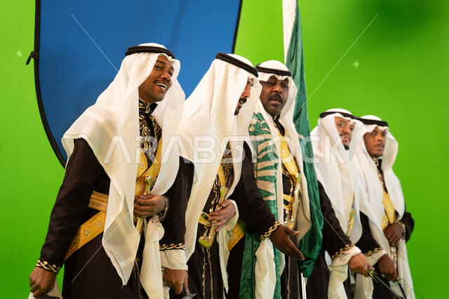Popular festivals and dancing with swords with regular movements on national occasions and holidays, singing and recitation of enthusiastic poems and Saudi poetry, wearing Arda Najd costumes, the Saudi National Day on September 23, the flag day celebratio