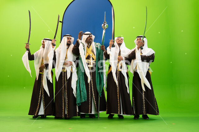 Folk dancing on national holidays and occasions, using the sword with regular movements in the Saudi Ardha, commemorating the Saudi National Day on September 23, gestures of laughter and happiness, singing and reciting enthusiastic poems and Saudi poetry,