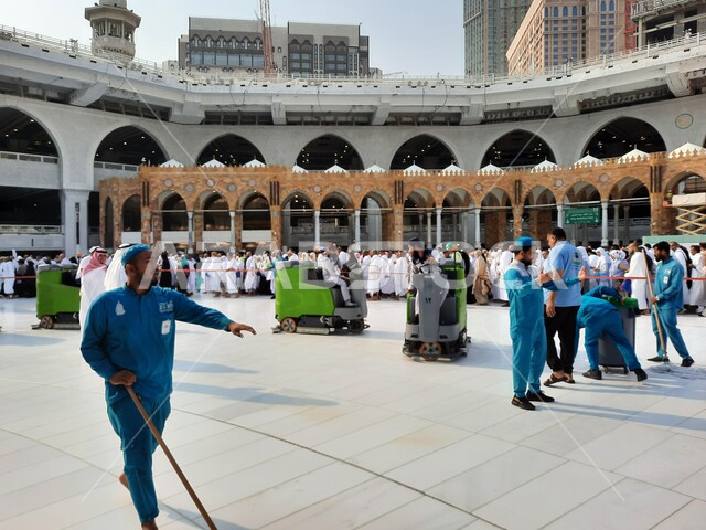 Pilgrims and Muslims in the courtyards of the Holy Mosque in Mecca, the ...