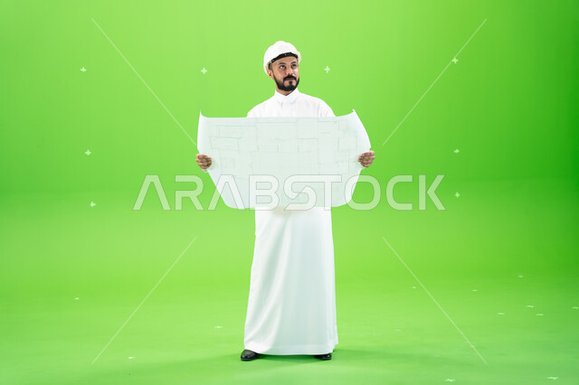 Developmental engineering projects, construction and architectural plans, support and development of the engineering sector, Saudi jobs and professions, portrait of a Saudi Gulf Arab engineer wearing a traditional dress and a protective hat standing at th