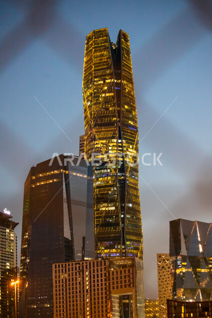 Distinctive architecture in Saudi Arabia, economic and financial towers in CAFD, King Abdullah Financial Center in Riyadh, Saudi Arabia at night, famous Riyadh landmarks, illuminated towers and skyscrapers