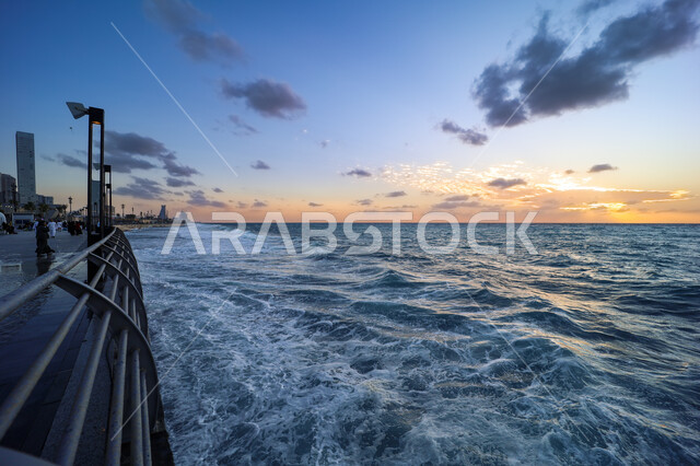 The waterfront of the Jeddah Corniche, the Jeddah Art Promenade area on the shore of the Red Sea, sea waves at sunset, famous landmarks and tourist places in Saudi Arabia