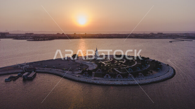 الواجهة البحريه وكورنيش الدمام  وقت غروب الشمس، صورة جوية لجزيرة المرجان الاصطناعية في الخليج العربي، أماكن ومعالم ترفيهية عائلية، وجهه سياحية لجذب السياح إلى المملكة العربية السعودية، الأعمال الفنية الهندسية المعمارية وسط الطبيعة البحرية