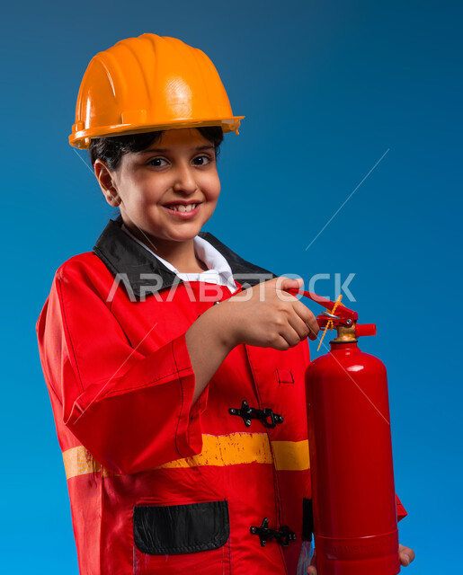 Tools and equipment needed to put out fires, civil protection in the field of civil defense, a close-up portrait of a Saudi Gulf Arab girl wearing a helmet and a protective vest, holding a fire extinguisher and looking at the camera, future childhood dreams and wishes for girls, blue background