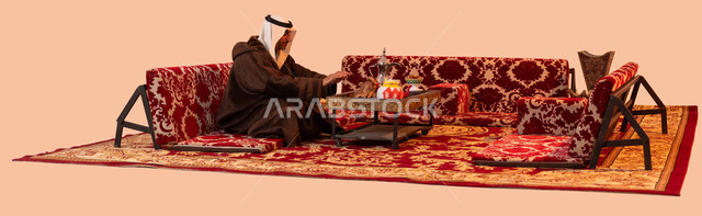 The calm atmosphere in the camping places, a popular youth camping session, the ancient lifestyle, heating gestures on the stove, a portrait of an old Saudi Gulf Arab man wearing traditional dress and warm winter clothes, sitting in front of a flame of fire, beige background.