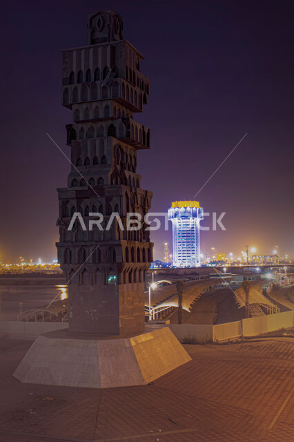 الفن الهندسي المعماري للأبراج وناطحات السحاب المضيئة ليلا، أماكن سياحيه مشهوره في جده التاريخيه ،مجسم الروشان الخشبي على ساحل البحر الاحمر في مدينة جده في المملكه العربيه السعوديه ليلا, مجسمات تاريخيه شعبيه على الواجهه البحريه