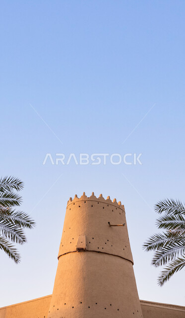 Historical civilization in Riyadh, a close-up of the historic Al-Masmak Palace in the city of Riyadh in the Kingdom of Saudi Arabia, architecture and ancient mud buildings from Saudi heritage, touristic places and landmarks in Saudi Arabia.
