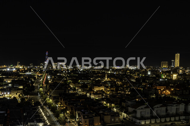 Buildings and facilities illuminated at night, the architecture of the historic houses of Jeddah, enjoying the quiet night views, famous tourist attractions in the Kingdom of Saudi Arabia