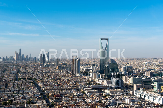  الفن الهندسي المعماري المتطور لأبراج العاصمة السعوديه, تنمية المنشآت الهندسية الحديثة في المملكة، أماكن ومعالم سياحية مشهورة لجذب الزوار من شتى أنحاء العالم، ناطحات السحاب والمباني السكنية في وقت النهار في مدينة الرياض.