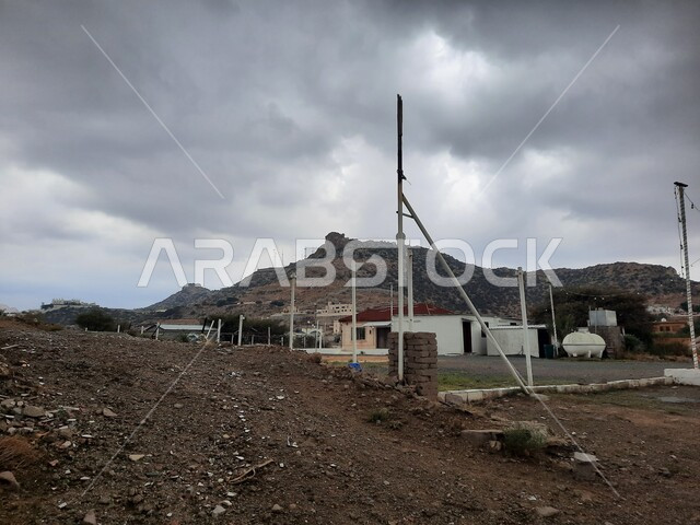 A view of the cloudy sky in the city of Taif, a distinctive tourist destination during the winter, paved roads and streets in Saudi Arabia, the route of cars in the Al-Hada area, old residential neighborhoods, desert sand dunes in the streets of the Kingdom