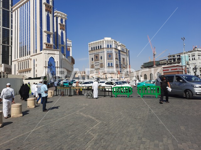 Advanced architectural engineering for towers and tourist buildings, a vehicle station for transporting pilgrims and Umrah pilgrims to the Grand Mosque in front of the Jabal Omar Towers in Mecca, luxury Conrad hotels and resorts in Saudi Arabia, private parking on Ibrahim Al Khalil Street.