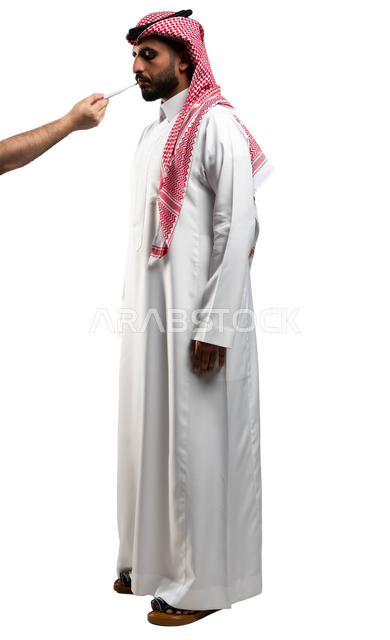 The need for treatment and assistance, the feeling and feeling of being sick and exhausted, a portrait of a Saudi Gulf Arab young man wearing a shemagh