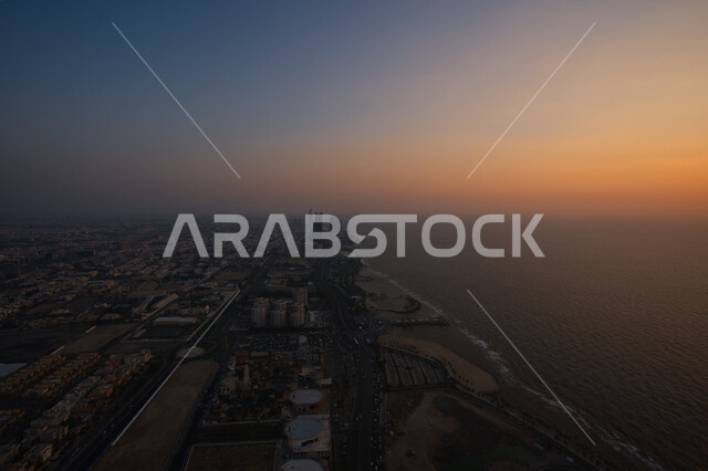 النمو والتطور العمراني للمنشآت وناطحات السحاب, صورة درون جوية لكورنيش مدينة جدة وقت غروب الشمس، الواجهه البحرية المطلة على ساحل البحر الاحمر، معالم واماكن جذب سياحية في المملكة العربية السعودية، 