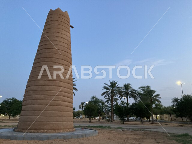 The architectural art of the archaeological Al-Shams Tower on the mountain peaks and heights in Al-Shams Governorate, the famous heritage landmarks of Al-Qassim, the roads, streets and gardens in the city of Buraidah in the Kingdom of Saudi Arabia, the towers built in the ancient stone style