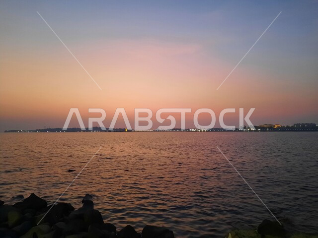 The center of attraction for tourists from around the world, the view of the Jeddah Corniche at sunset, the waterfront in Saudi Arabia, enjoying a special summer trip, recreational tourist places in the Kingdom, interest in planting palm trees, nature backgrounds