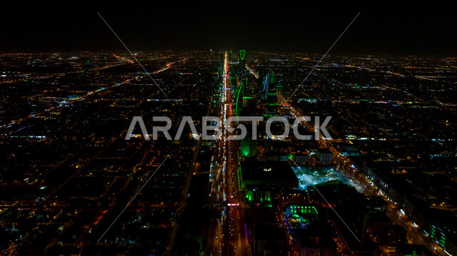 Expansion and urban progress of the skyline of the city of Riyadh in the Kingdom of Saudi Arabia, famous commercial and economic landmarks, national occasions and holidays, commemoration of the Saudi founding day 1727, Saudi National Day activities on September 23, towers and skyscrapers at night time