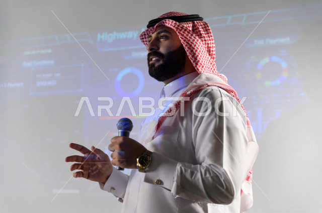 Close-up picture of a Saudi businessman, a speaker and a participant in the businessmen and companies training course, business development and partnerships, a business meeting, training course, employee meeting, university lecture