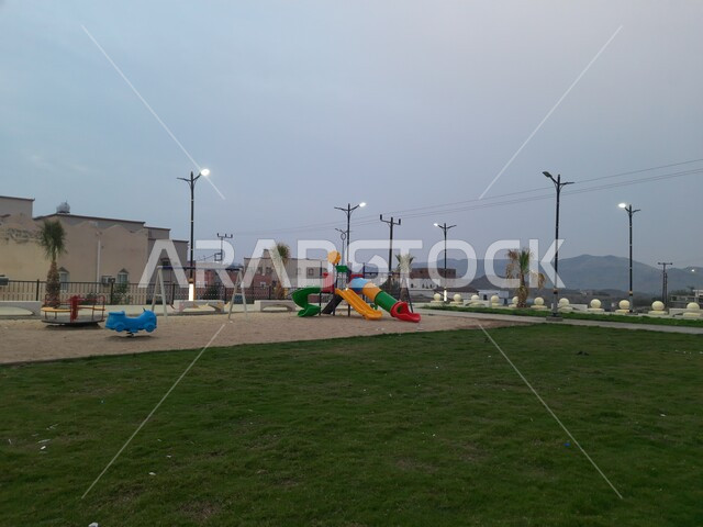 Enjoying the tranquil atmosphere at sunset, parks and recreational gardens in the Kingdom of Saudi Arabia, roads prepared to attract tourists from all over the world, terrain in the mountain peaks and heights, tourist places in the Al-Hajra area in the city of Al-Baha