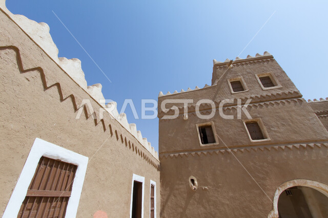 The ancient historical mud buildings in the village of Ushaiqar in Riyadh, a close-up of one of the heritage houses from different parts of the Kingdom of Saudi Arabia, archaeological and cultural tourist places, distinctive landmarks and places to attract and attract tourists from the world