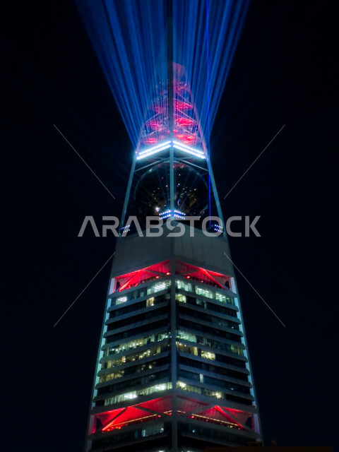Saudi Arabia Light Festival, an artistic journey for creative light transformation, entertainment activities and events to attract tourists from abroad, the seasonal Riyadh Art Program initiative, enjoying the forms of light arts, annual events and celebrations, a close-up of the colorful light shows on the Al-Faisaliah Tower in the Kingdom