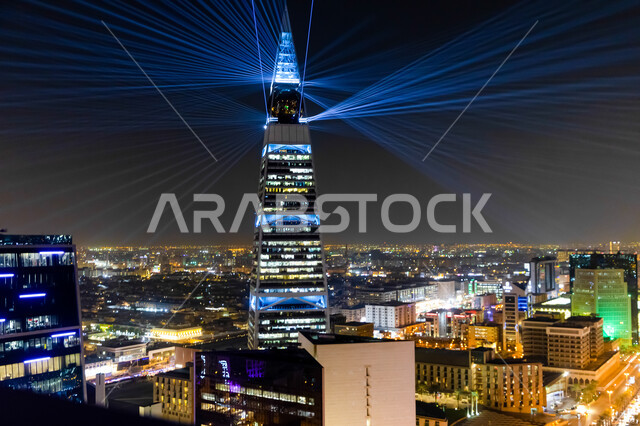 Saudi Arabia Light Festival, an artistic journey for creative light transformation, entertainment activities and events to attract tourists from abroad, the seasonal Riyadh Art Program initiative, enjoying the forms of light arts, annual events and celebrations, a picture from above of the colorful lighting shows on the Al Faisaliah Tower in the KingdomSaudi Arabia Light Festival, an artistic journey for creative light transformation, entertainment activities and events to attract tourists from 