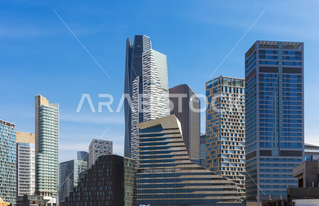 The King Abdullah Financial Center (KAFD) in Riyadh, the Kingdom, the famous landmarks of Riyadh, the ideal destination for finance and business with international standards, the architectural art of economic towers and skyscrapers, the leading high-end companies in banking services and financial technology.