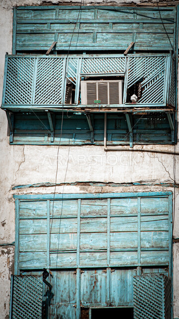 الرواشين القديمه في المدينة التاريخية في جدة بتصميم معماري عربي و إسلامي قديم، البيوت الأثرية في البلد التاريخي في جدة, أماكن سياحية تراثية شعبية في المملكة العربية السعودية، المعالم التاريخية في حي البلد