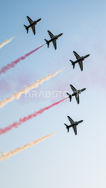 National holidays and events, lines of colored smoke behind jet planes flying in the skies of the Kingdom, air shows celebrating the anniversary of the Saudi National Day, expressing love and loyalty to the country, aviation exhibition activities for the National Day on September 23, commemorating the Founding Day 1727 AD, Saudi Flag Day.