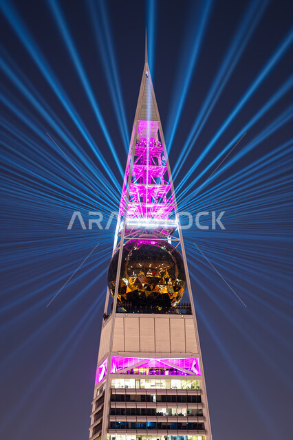 Saudi Arabia Light Festival, an artistic journey for creative light transformation, entertainment activities and events to attract tourists from abroad, the seasonal Riyadh Art Program initiative, enjoying the forms of light arts, annual events and celebrations, a close-up of the colorful light shows on the Al-Faisaliah Tower in the Kingdom