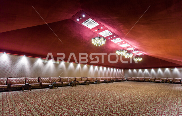 A traditional tent from the inside, popular Arabic sessions, places for land trips, authenticity, heritage and nobility in the Kingdom of Saudi Arabia, the Bedouin house in the desert