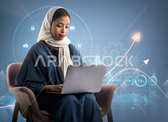 عدسة رموز رقمية الكترونية، مؤشرات وبيانات إحصائية قياسية، سيدة اعمال عربية خليجية سعودية محجبة ترتدي العباءة تقوم بالعمل على جهاز اللابتوب بإيماءات الاندماج والتركيز، متابعة مخطط الرسم البياني للنمو الاقتصادي، خلفية أسهم وخطوط بيانية هولوجرامية